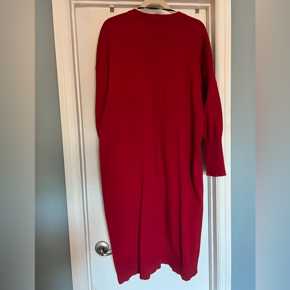 Torrid size 1 button up cardigan. maxi length. Never worn.